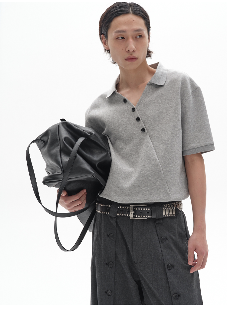 CHIC MISPLACED BUTTON POLO SHIRT