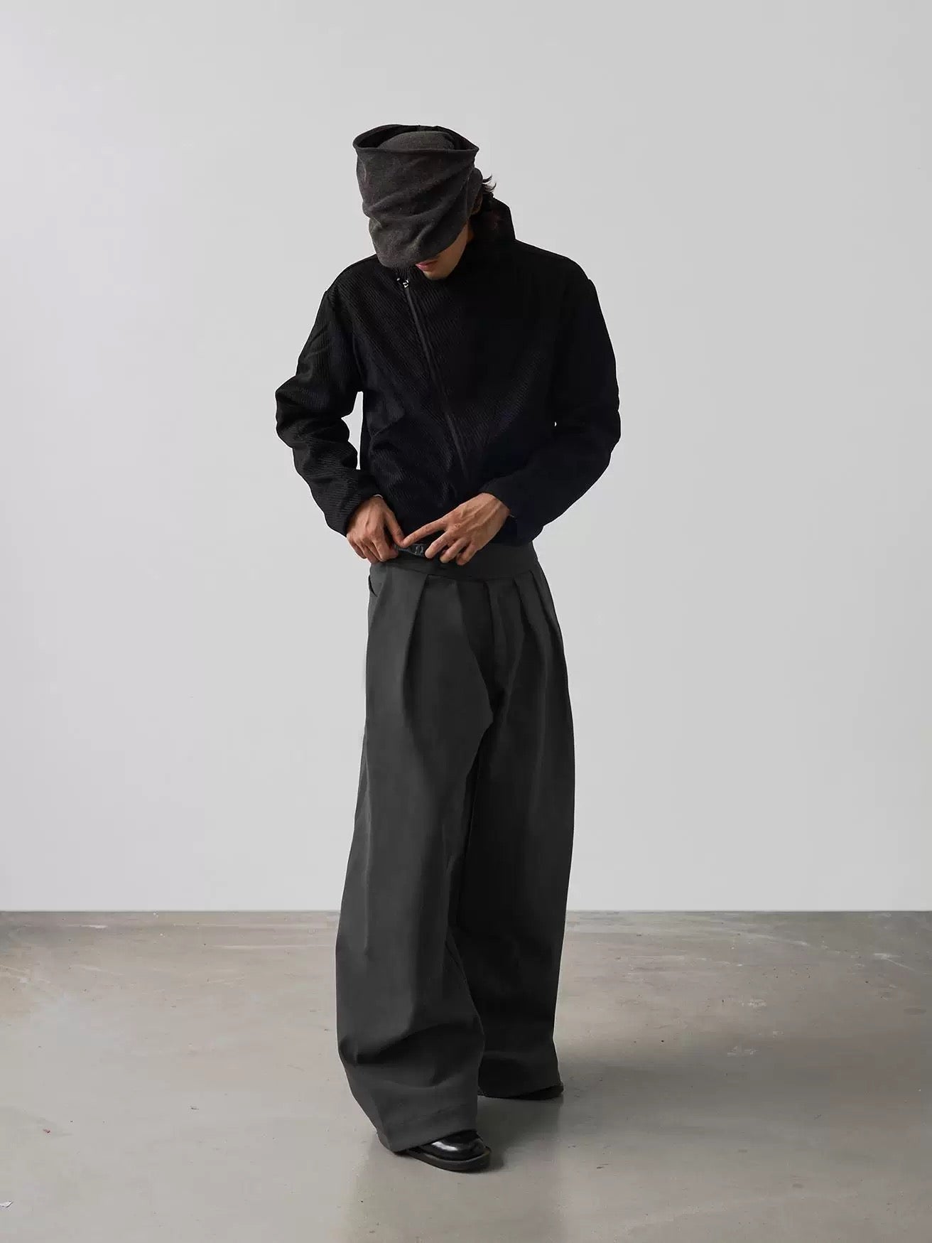 PLEATED BUCKLE TROUSERS