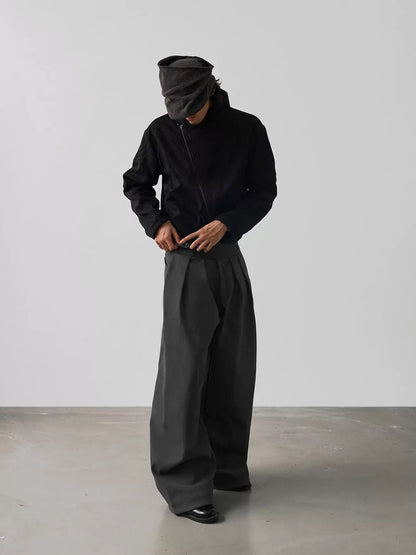 PLEATED BUCKLE TROUSERS