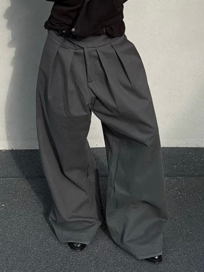 PLEATED BUCKLE TROUSERS