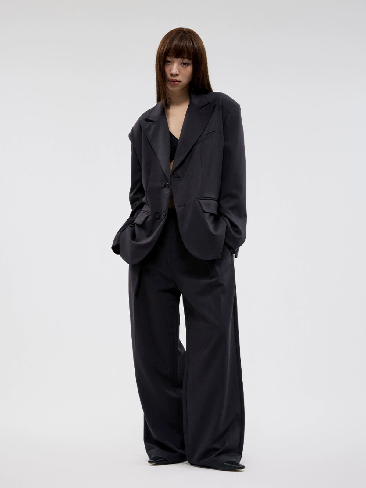 BLACK PLEATED SLACKS