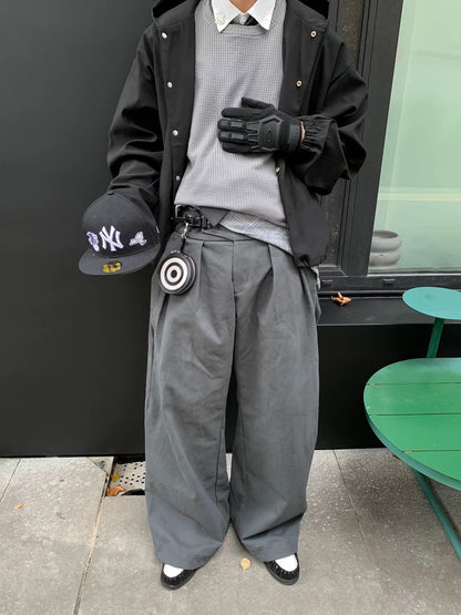 PLEATED BUCKLE TROUSERS