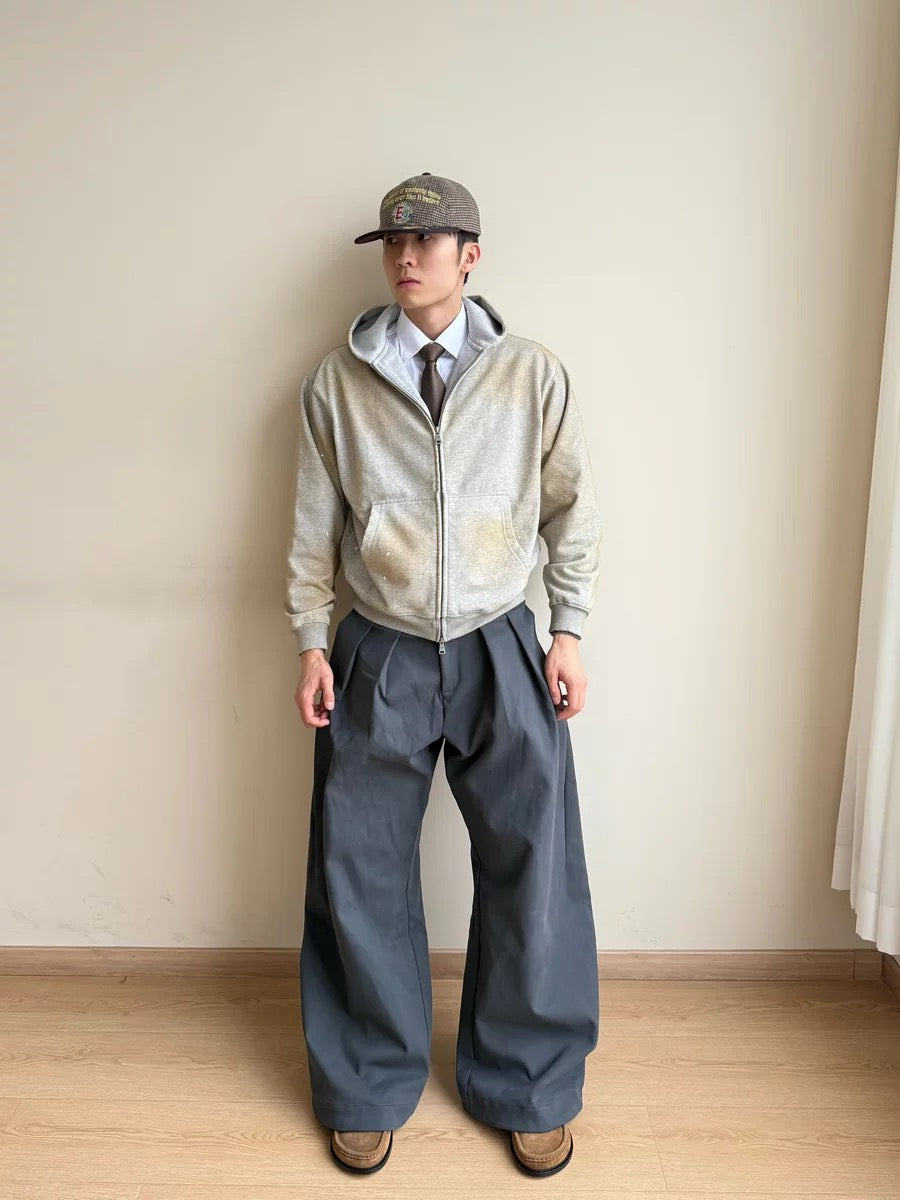 PLEATED BUCKLE TROUSERS