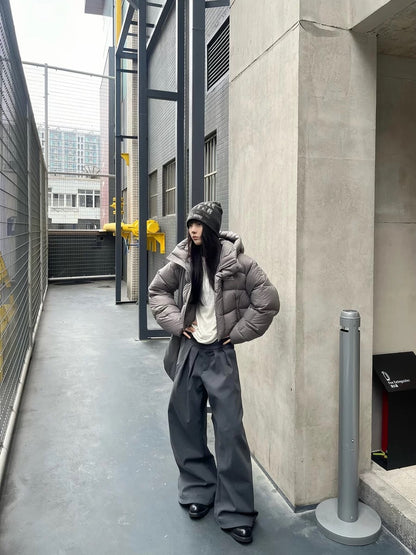 PLEATED BUCKLE TROUSERS