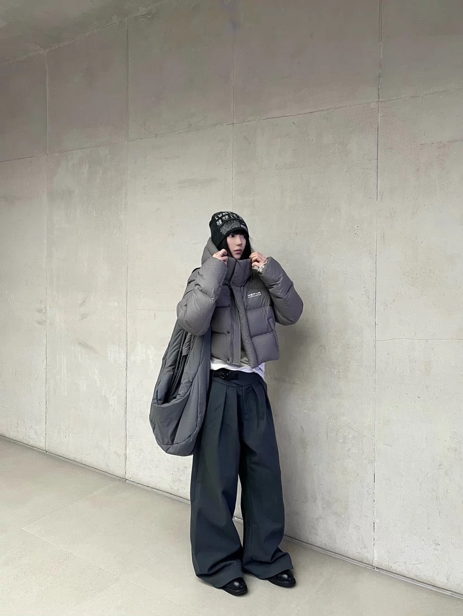 PLEATED BUCKLE TROUSERS