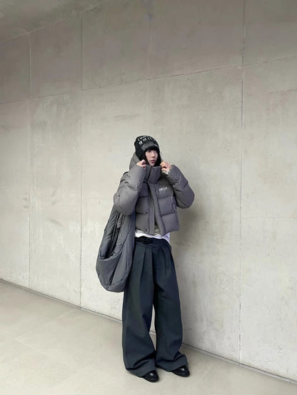 PLEATED BUCKLE TROUSERS