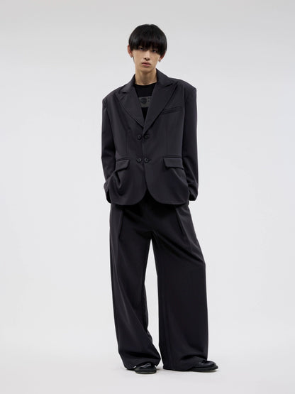 BLACK PLEATED SLACKS