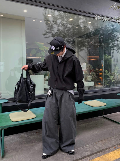 PLEATED BUCKLE TROUSERS