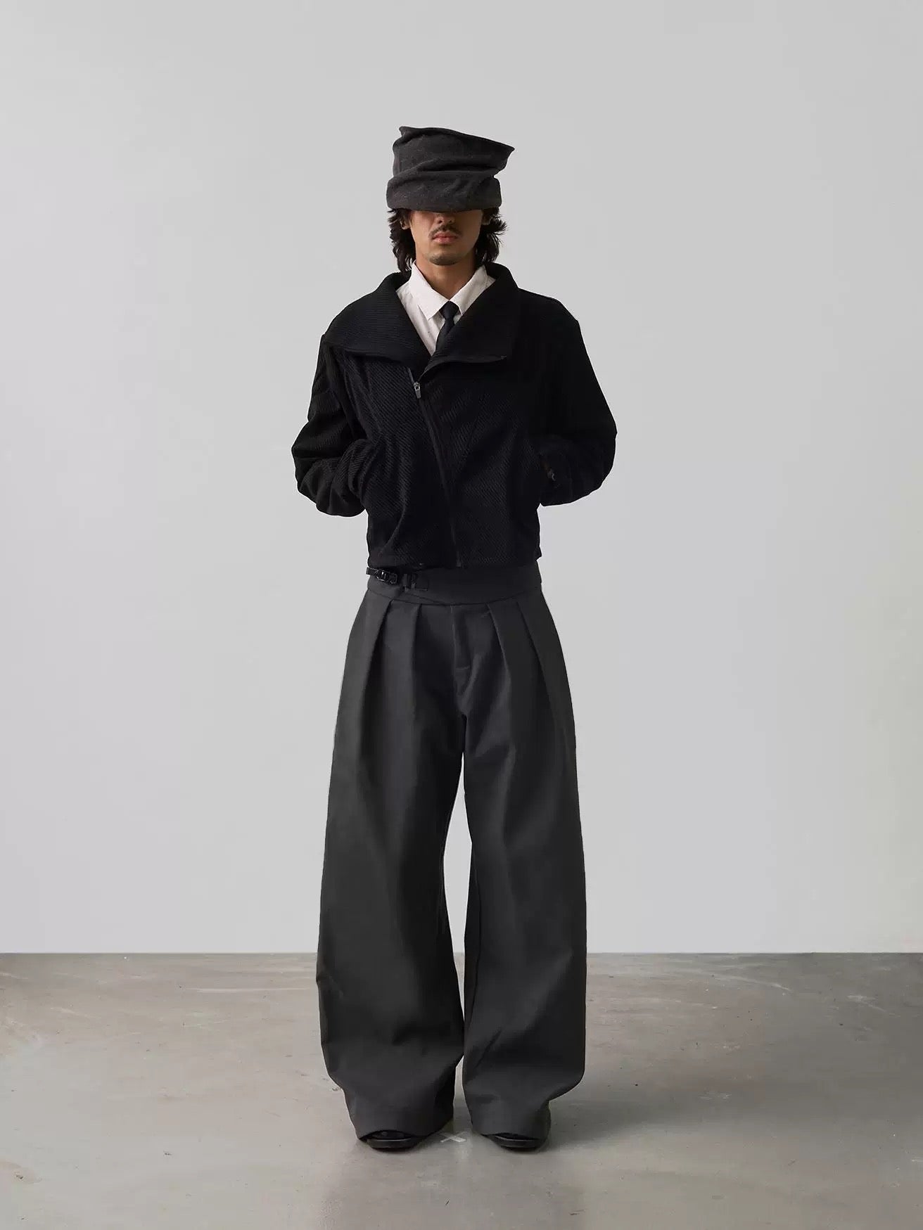 PLEATED BUCKLE TROUSERS
