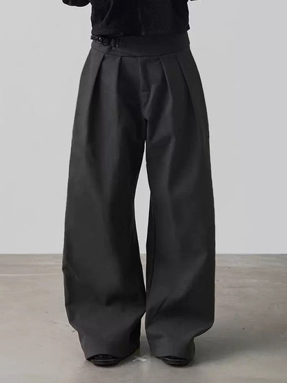PLEATED BUCKLE TROUSERS