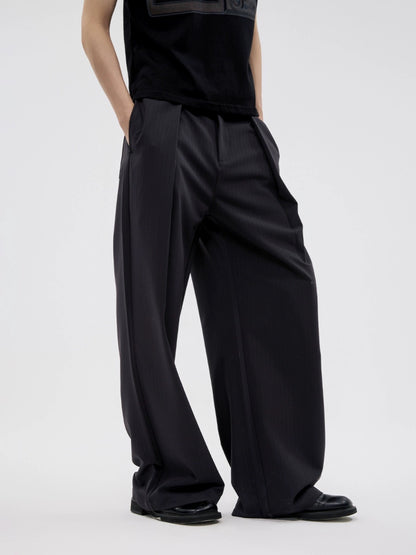 BLACK PLEATED SLACKS