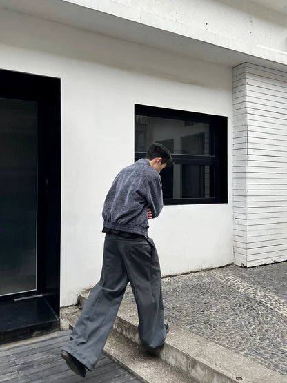 PLEATED BUCKLE TROUSERS