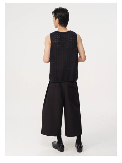 CURVED PLEATED PANTS