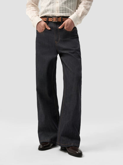 ASYMMETRICAL TWISTED DENIM