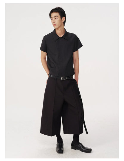 CURVED PLEATED PANTS