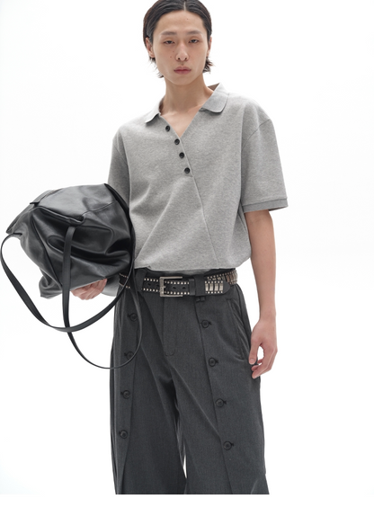 CHIC MISPLACED BUTTON POLO SHIRT
