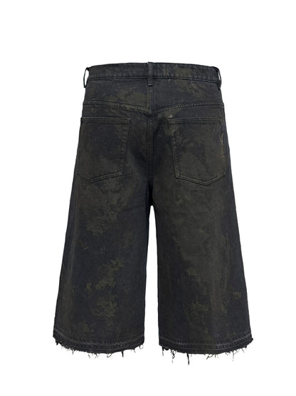 BLACK MUD-DYED DISTRESSED JEANS