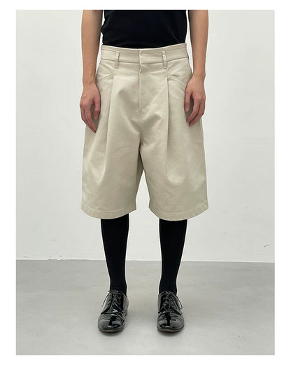 CROPPED KHAKI PLEATED SHORTS