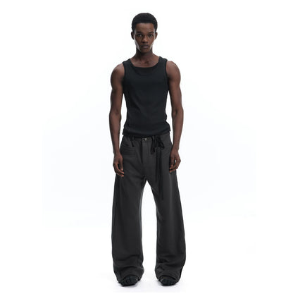 PATCHWORK SWEATPANTS WITH LEATHER CORDS
