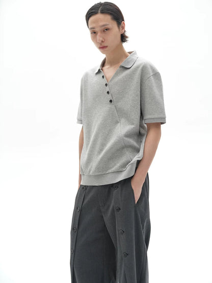 CHIC MISPLACED BUTTON POLO SHIRT