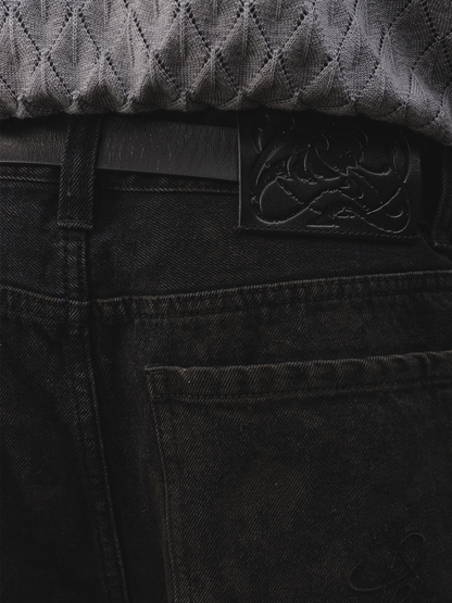 DISTRESSED BLACK DENIM PANTS