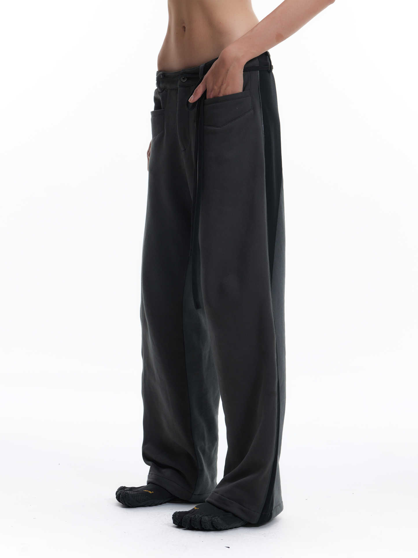 PATCHWORK SWEATPANTS WITH LEATHER CORDS