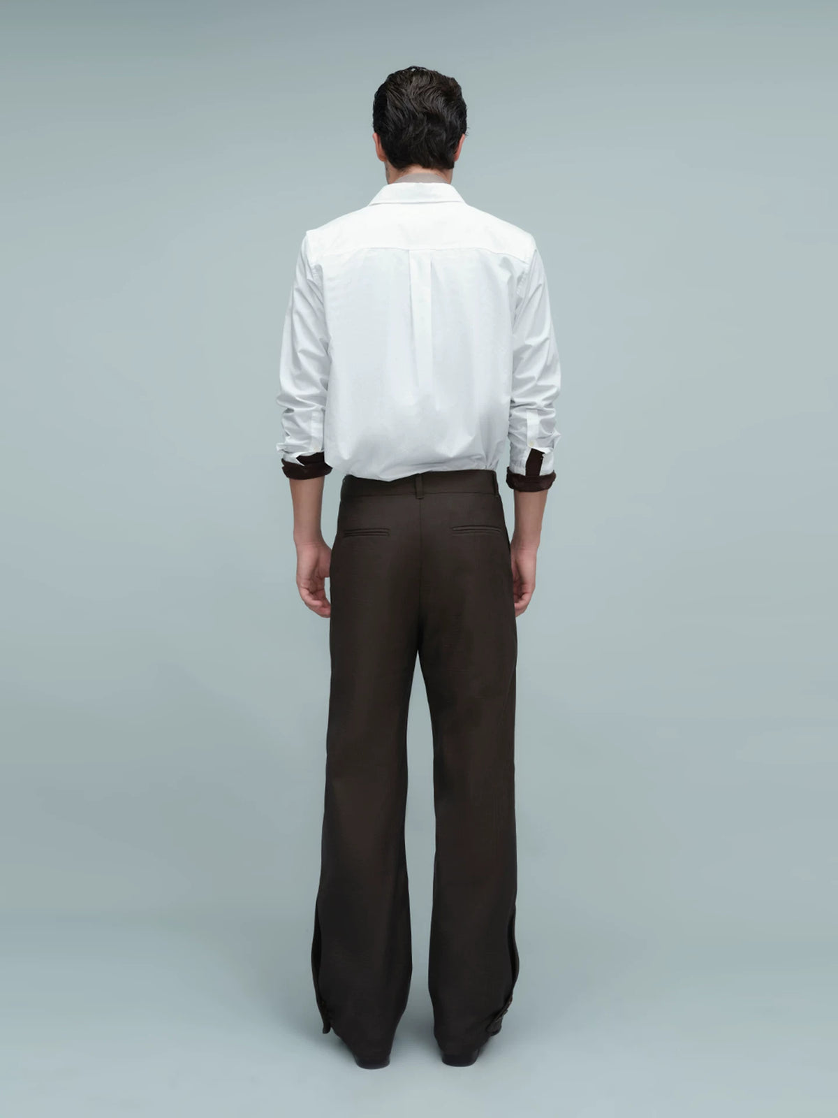 ASYMMETRIC WAIST BUTTON HEM TROUSERS ダークブラウン