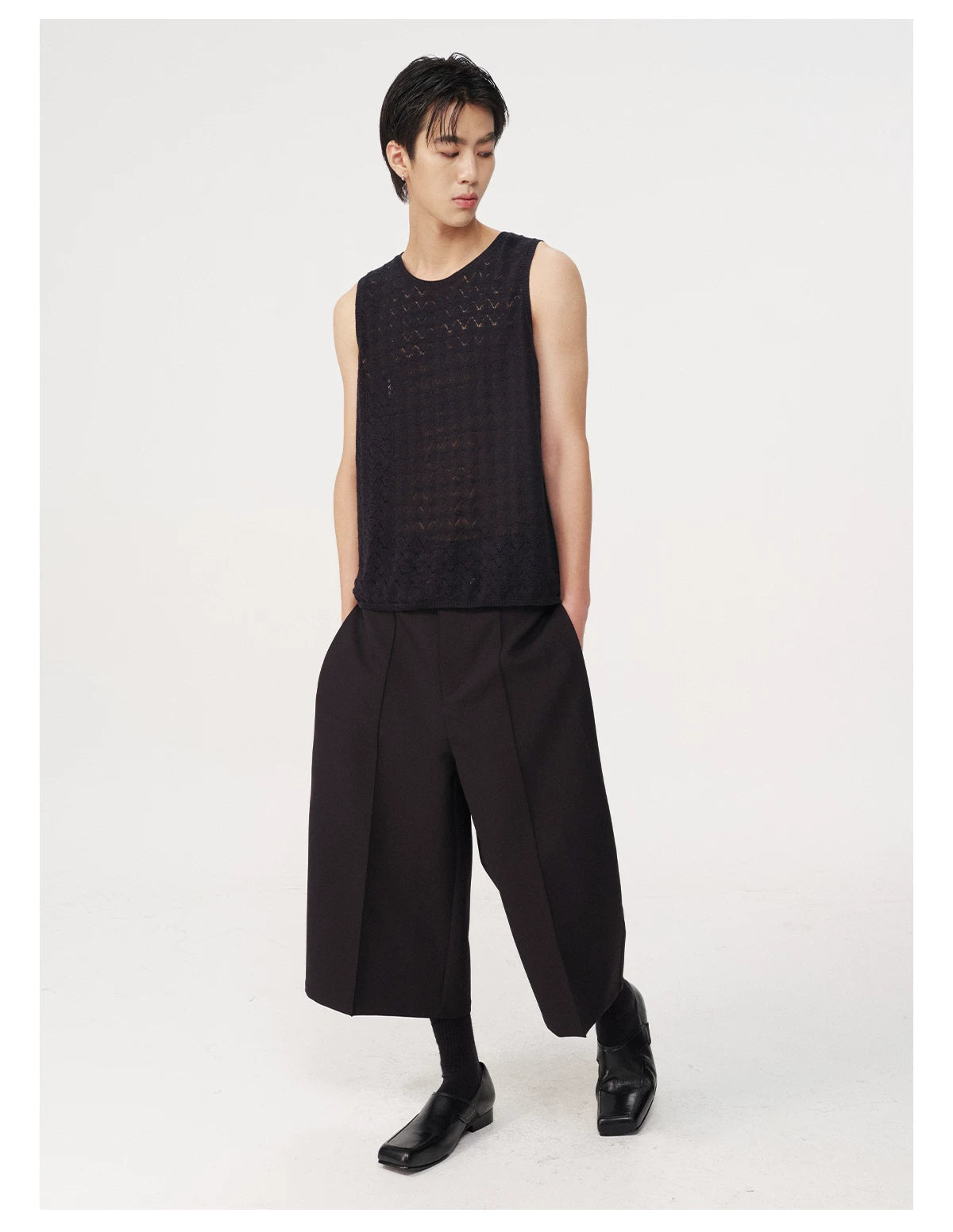 CURVED PLEATED PANTS