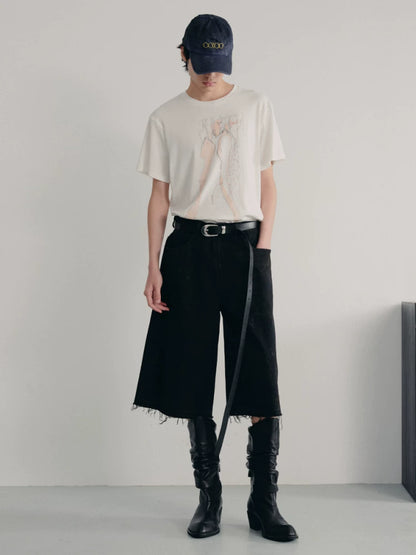 BLACK MUD-DYED DISTRESSED JEANS