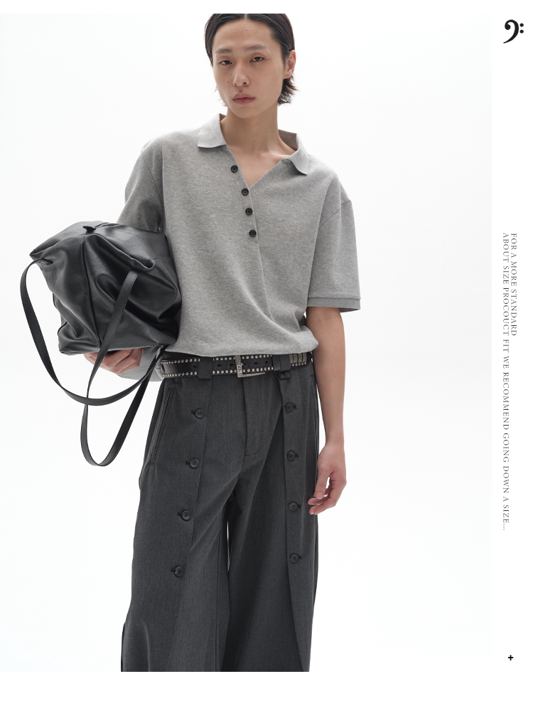 CHIC MISPLACED BUTTON POLO SHIRT
