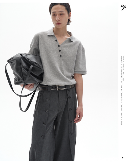 CHIC MISPLACED BUTTON POLO SHIRT