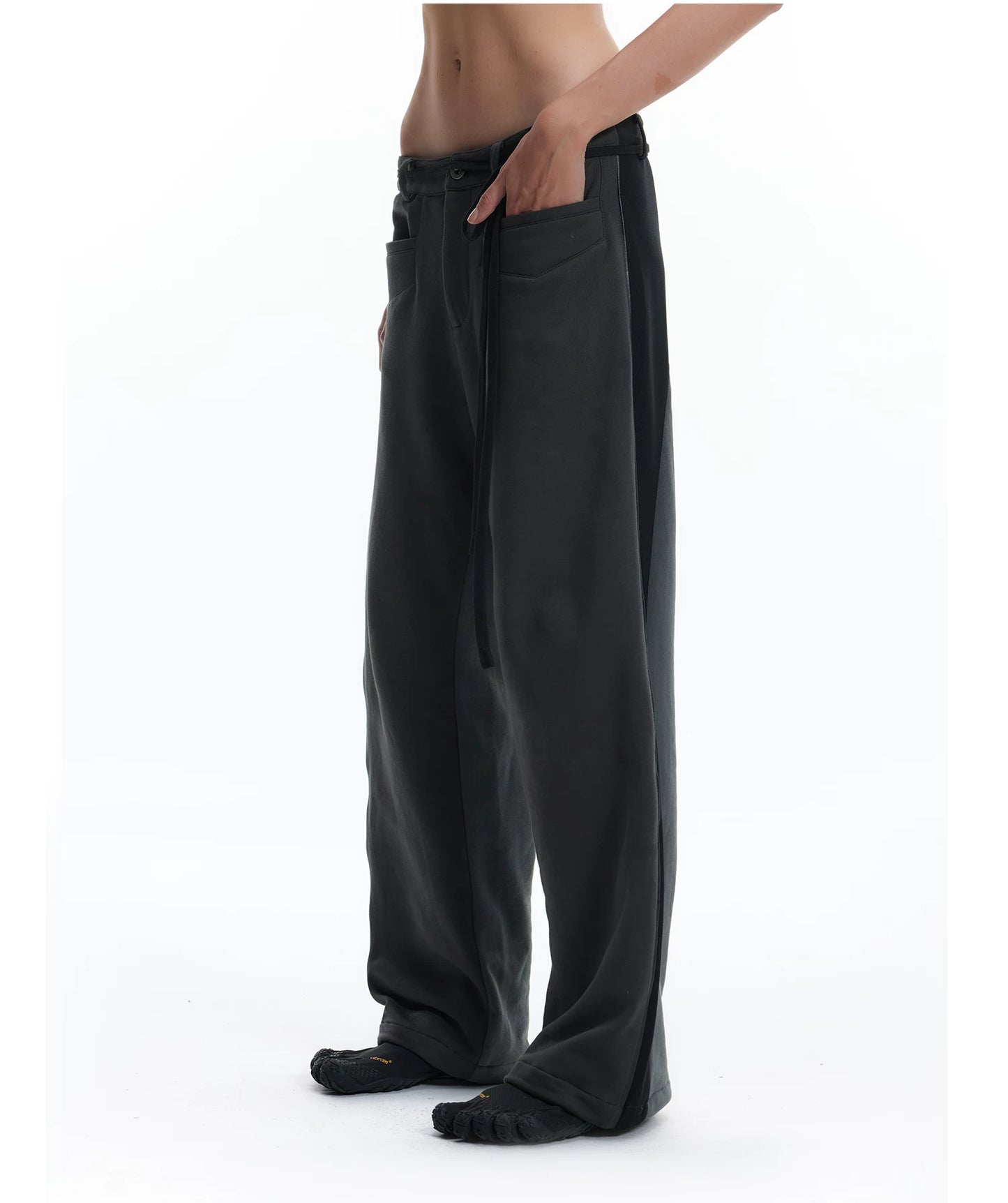 PATCHWORK SWEATPANTS WITH LEATHER CORDS