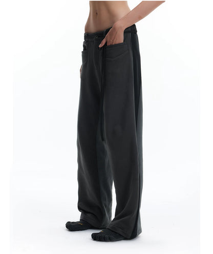 PATCHWORK SWEATPANTS WITH LEATHER CORDS