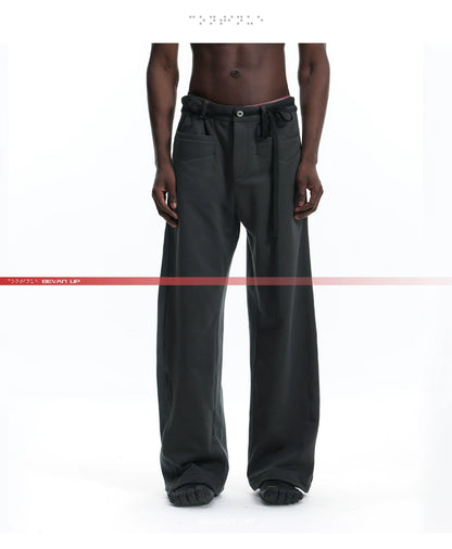 PATCHWORK SWEATPANTS WITH LEATHER CORDS