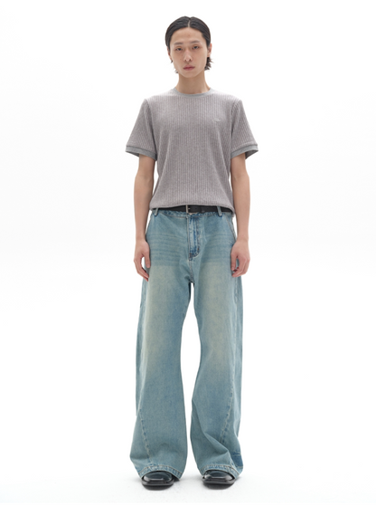 TWO-TONE TWISTED DENIM PANTS