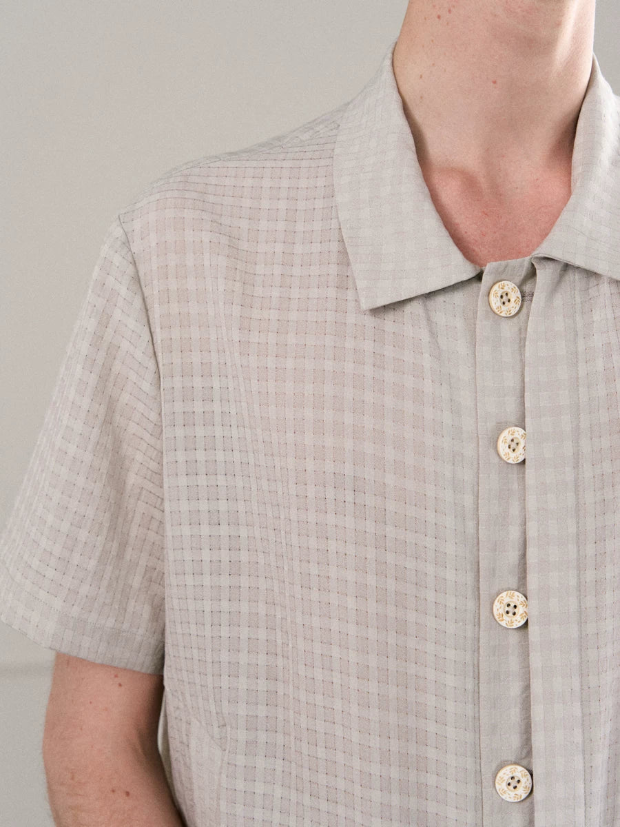 CHECKERED MESH HALF-PLACKET SHIRT