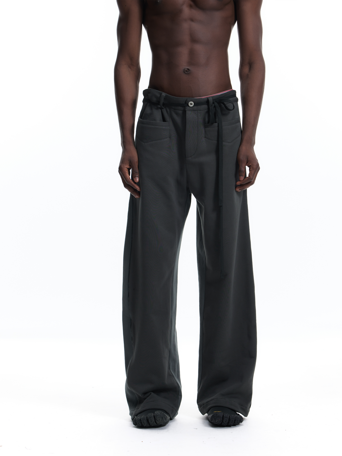 PATCHWORK SWEATPANTS WITH LEATHER CORDS