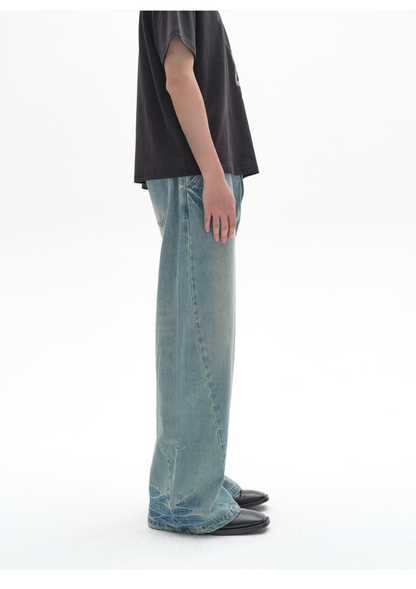 TWO-TONE TWISTED DENIM PANTS