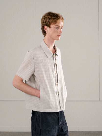 CHECKERED MESH HALF-PLACKET SHIRT