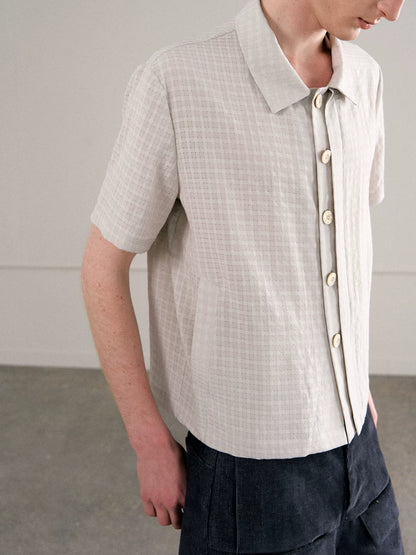 CHECKERED MESH HALF-PLACKET SHIRT