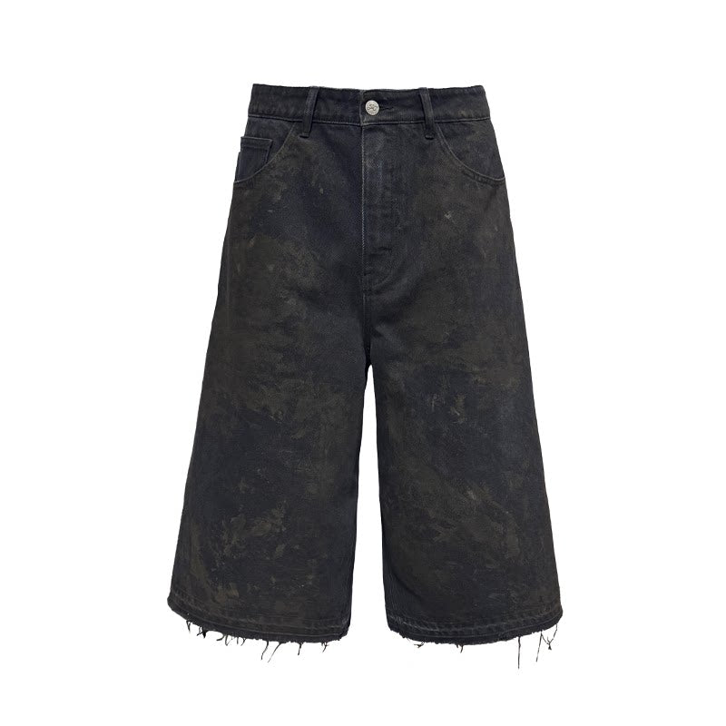 BLACK MUD-DYED DISTRESSED JEANS