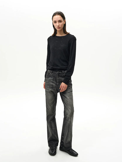WAXED FLARE DENIM PANTS