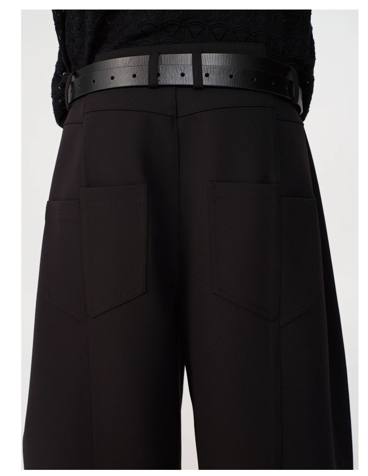 CURVED PLEATED PANTS