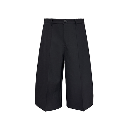CURVED PLEATED PANTS