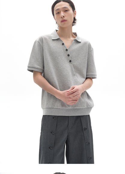 CHIC MISPLACED BUTTON POLO SHIRT