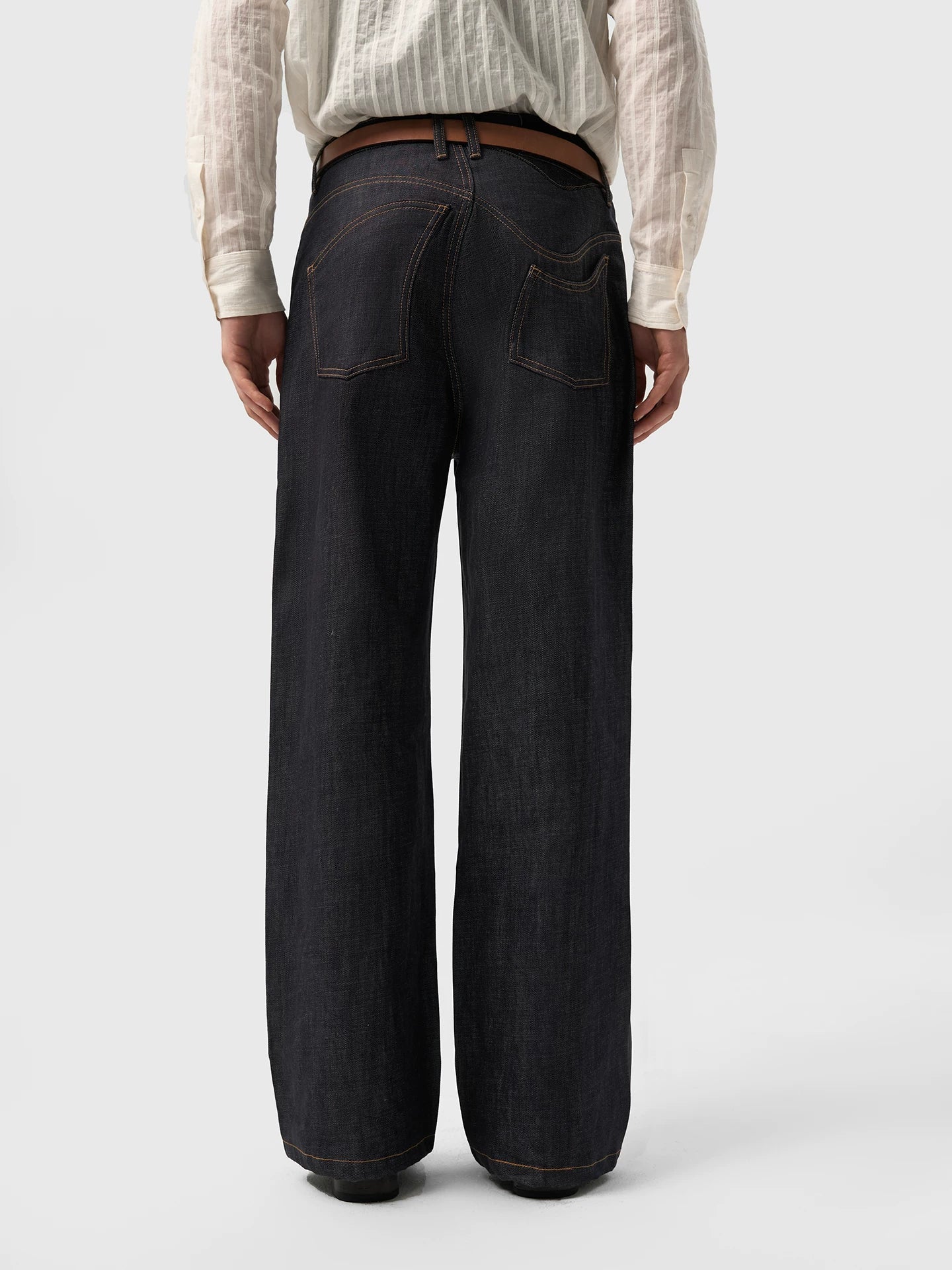 ASYMMETRICAL TWISTED DENIM