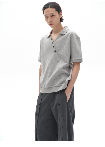 CHIC MISPLACED BUTTON POLO SHIRT