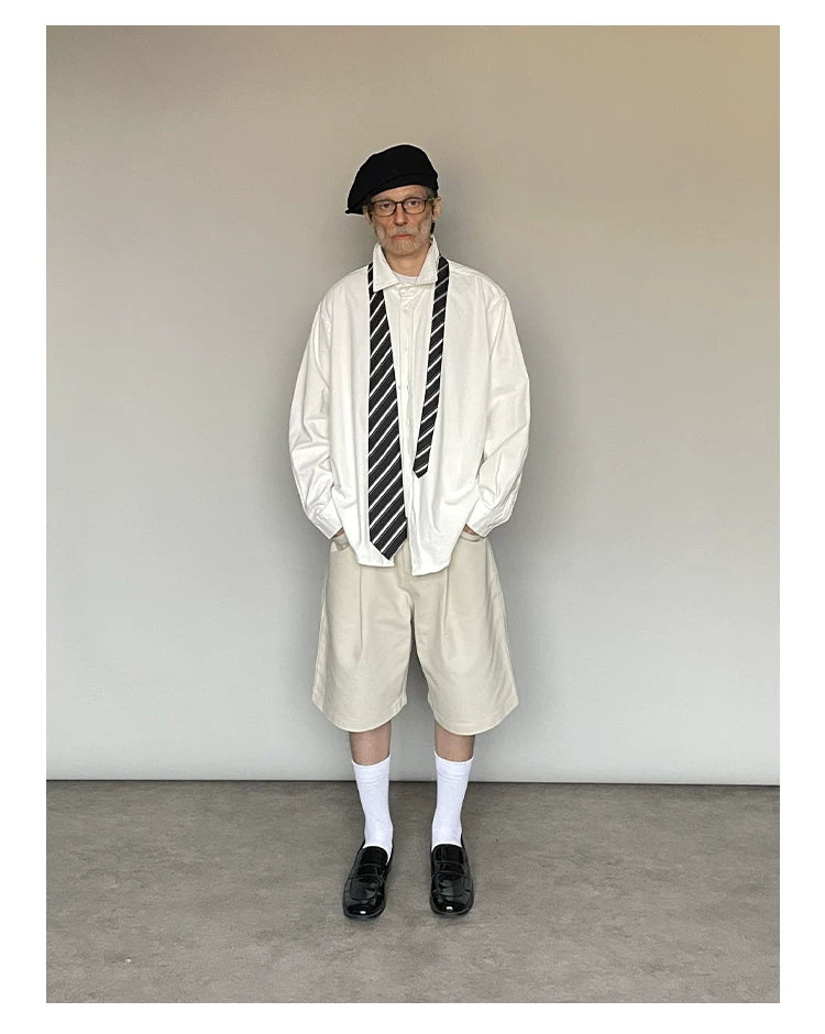 CROPPED KHAKI PLEATED SHORTS