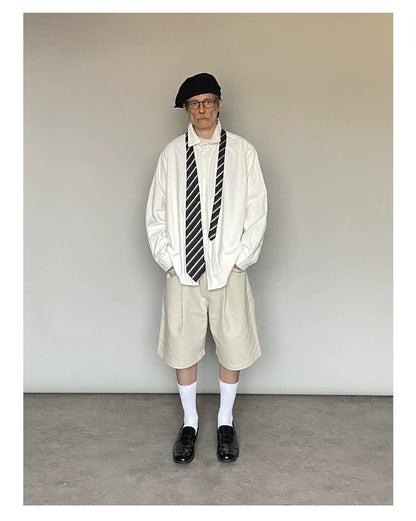 CROPPED KHAKI PLEATED SHORTS
