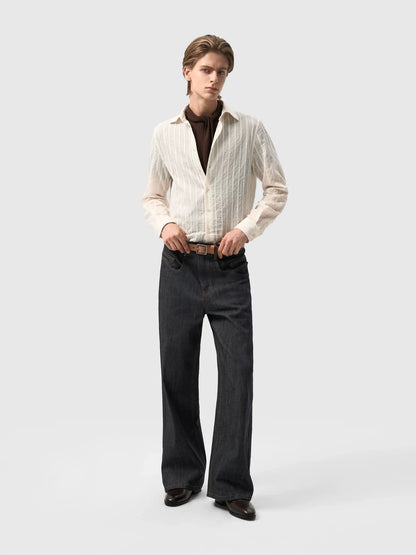 ASYMMETRICAL TWISTED DENIM